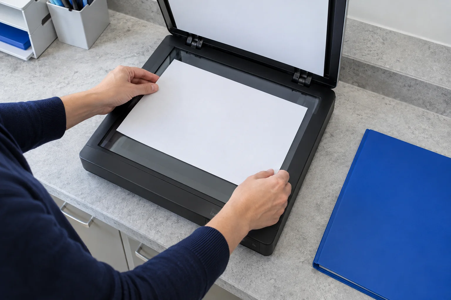 A school record being placed into a document scanner